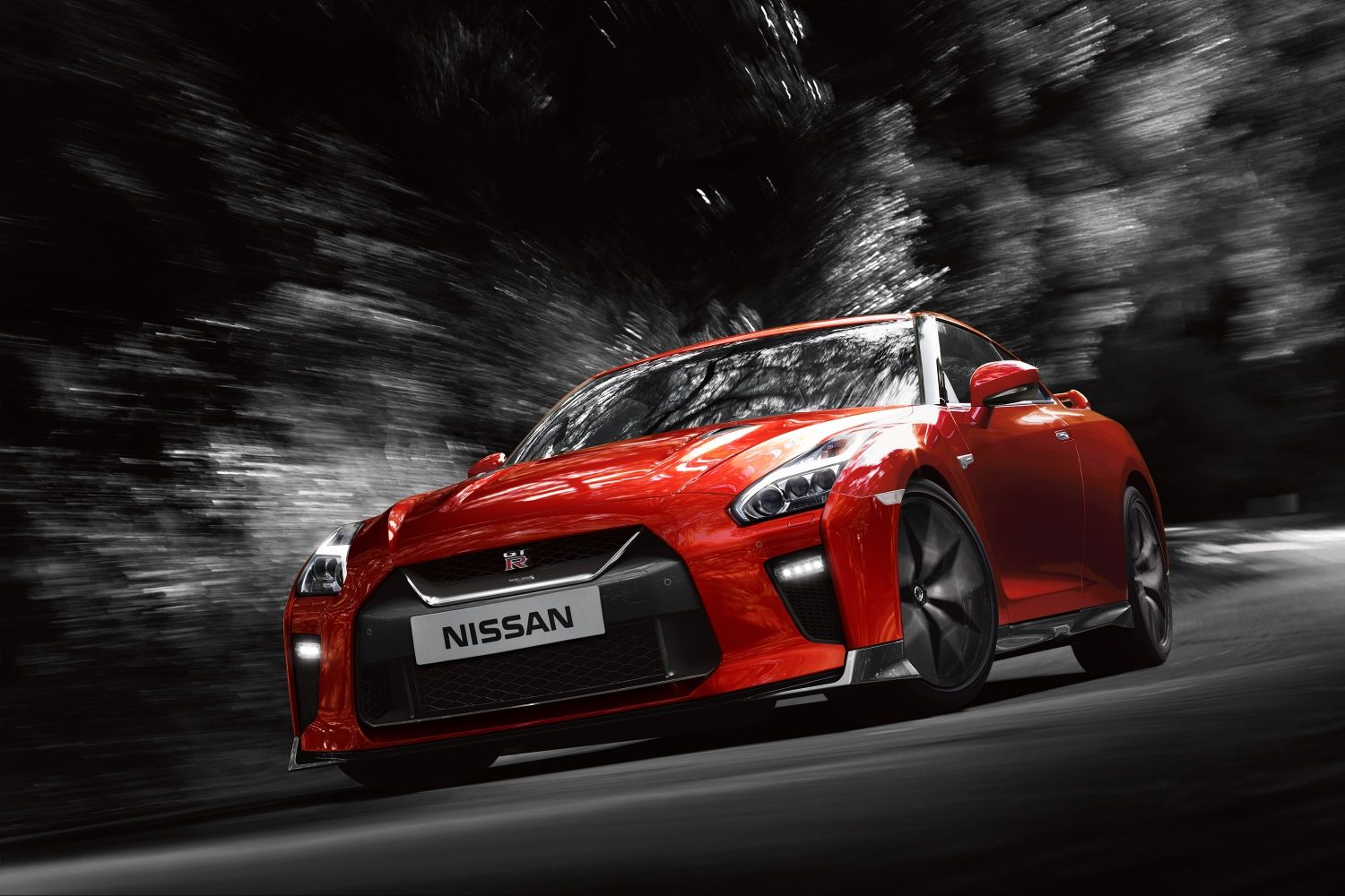 Red Nissan GT-R on the road